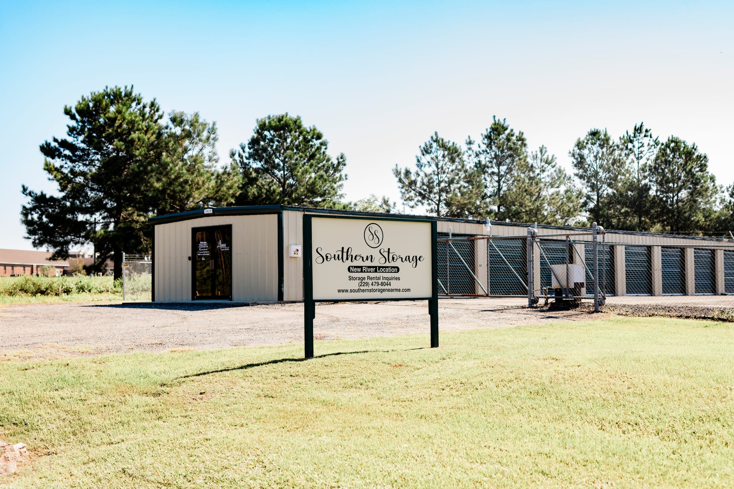 Southern Storage New River location sign in front of the office and gated drive-up storage units in Tifton, GA