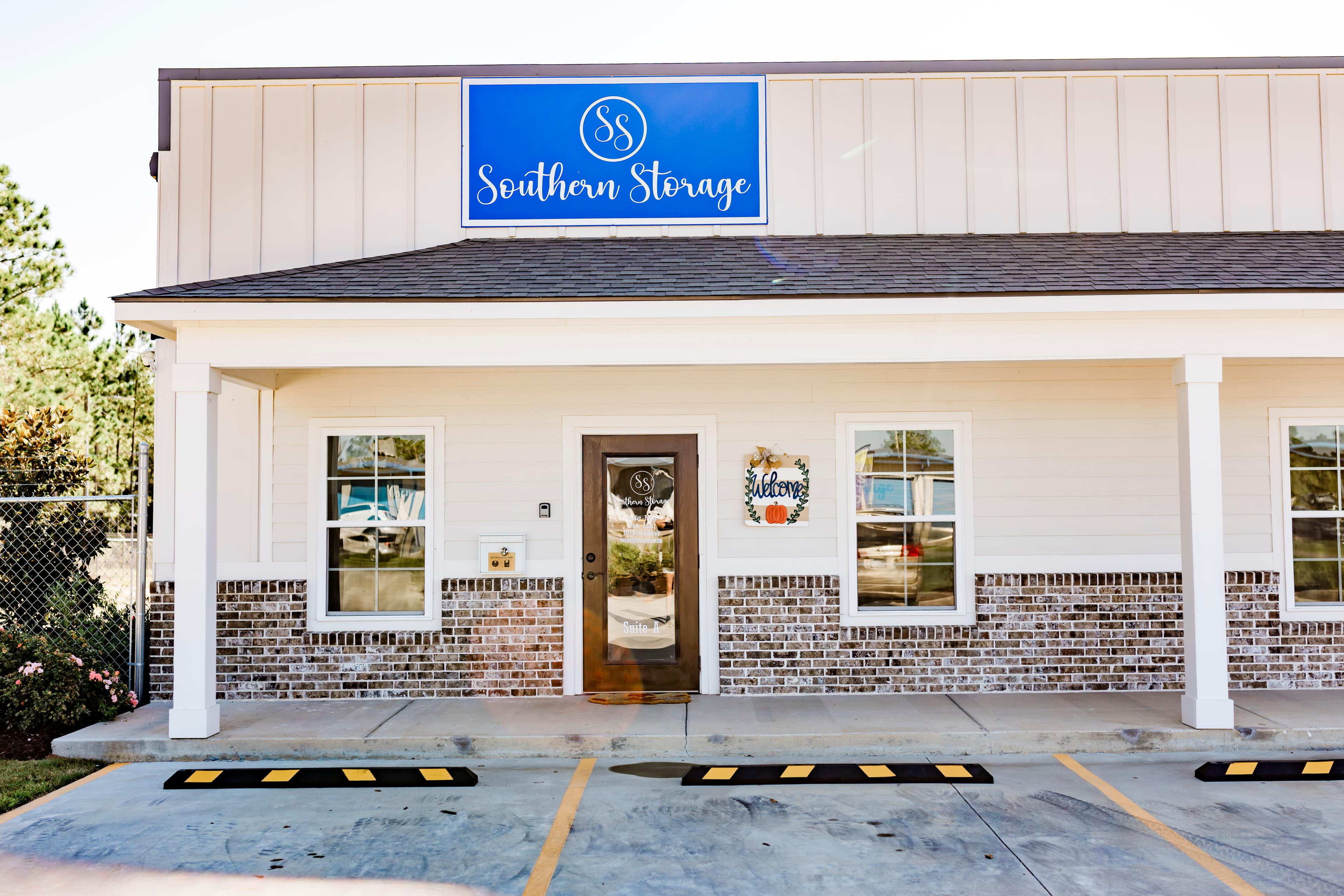 Southern Storage office building with the blue Southern Storage sign above the entrance